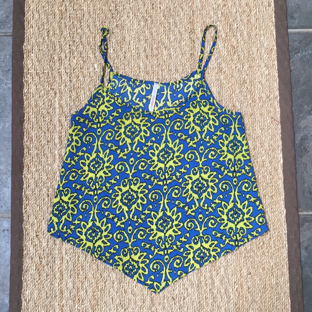 Bright patterned tank top.